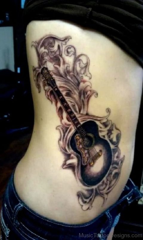 Black Guitar Tattoo On Rib