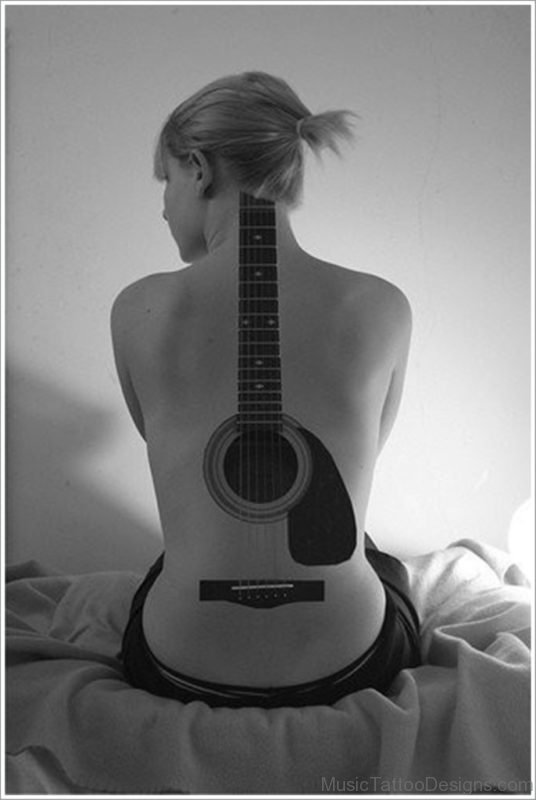 Guitar Tattoo On back