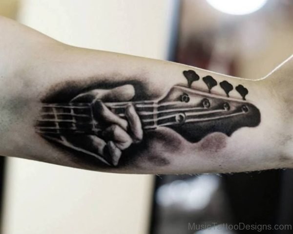 Hand And Guitar Tattoo