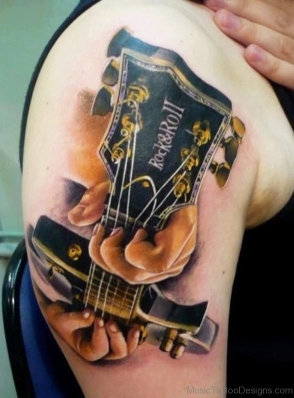 Impressive Guitar Tattoo On Shoulder
