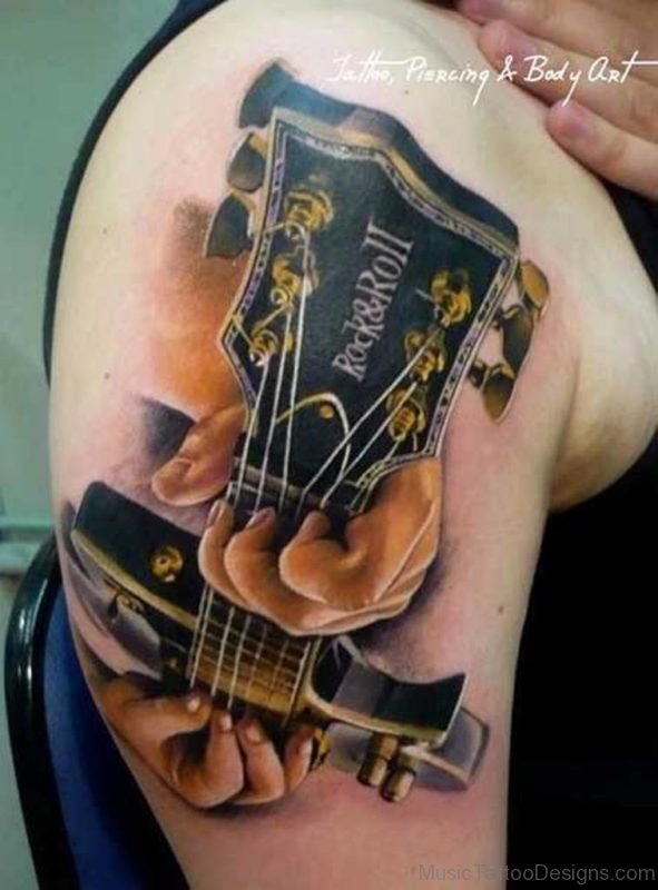 Stunning Guitar Tattoo On Shoulder