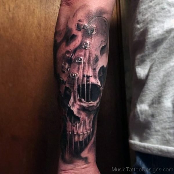 Unique combined black and white skull with guitar tattoo on arm