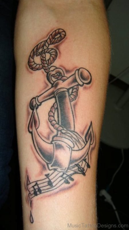 Anchor And Music Notes Tattoo On Arm