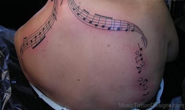 Attractive Music Tattoo On Back