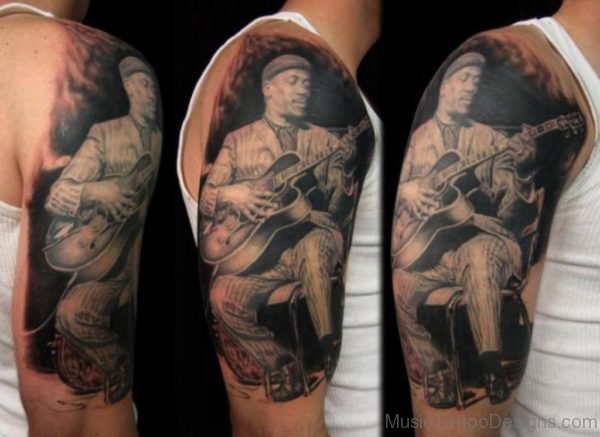 Awesome Guitar Tattoo On Half Sleeve