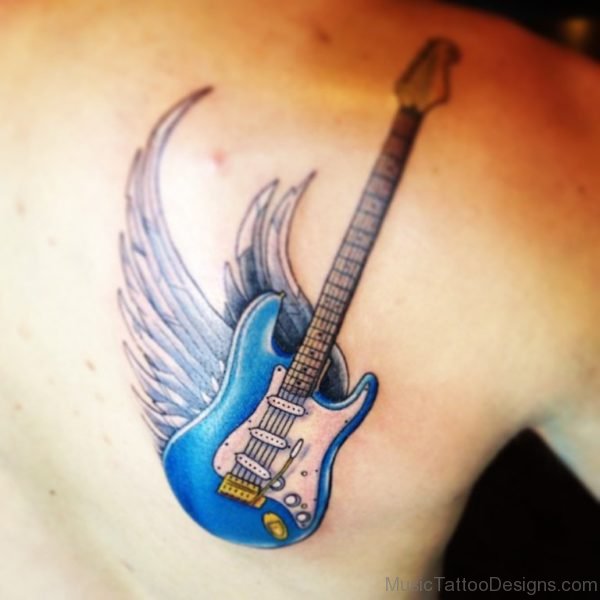 Band Player With Guitar Tattoo On Biceps