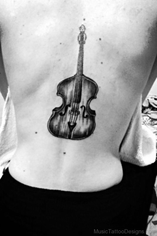 Black Ink Guitar Tattoo On Back