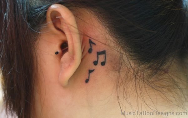Black Ink Music Notes Tattoo
