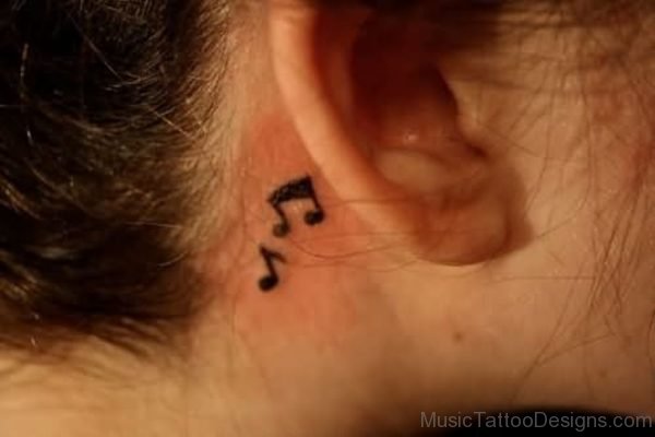 Black Ink Music Tattoo On Behind Ear