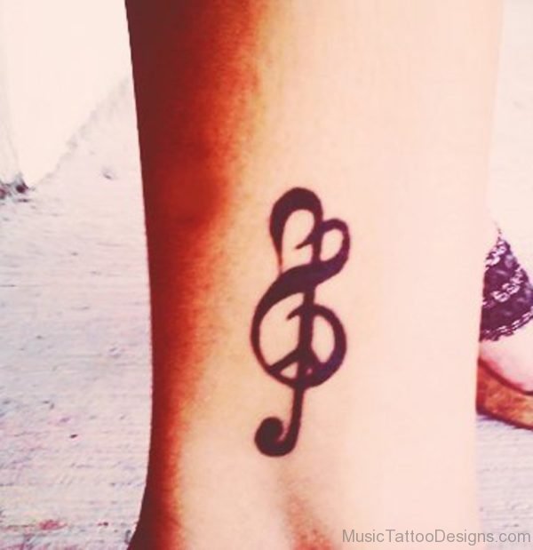 Black Music Note Tattoo On Leg