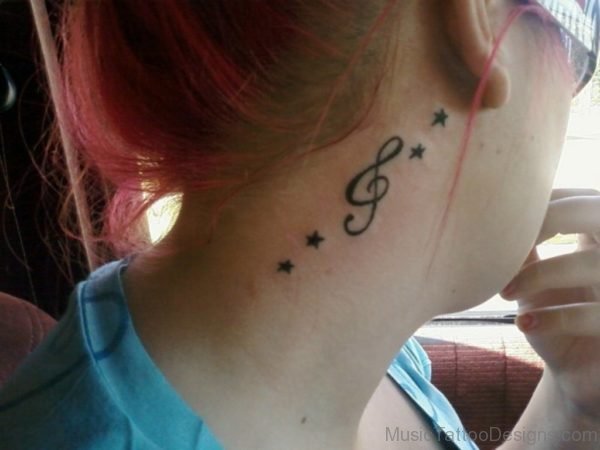 Black Star And Music Note Tattoo