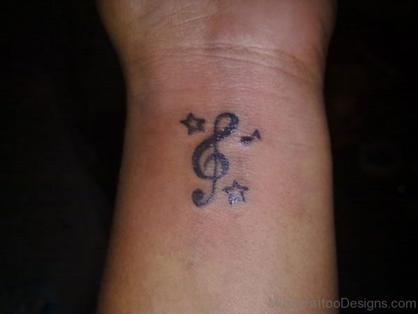 Black Stars And Music Note Tattoo 