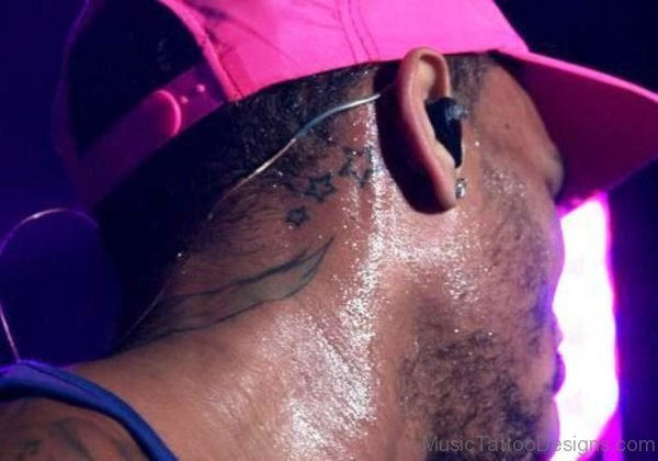 Chris Browns Back Ear Star Tattoo