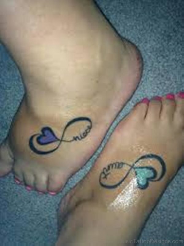 Colored Music Heart Tattoo On Foot