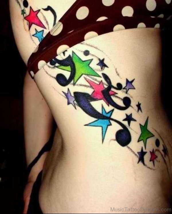 Colored Star And Music Tattoo