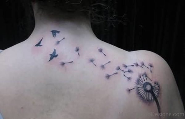 Cool And Nice Dandelion Tattoo Design On Upper Back For Girl