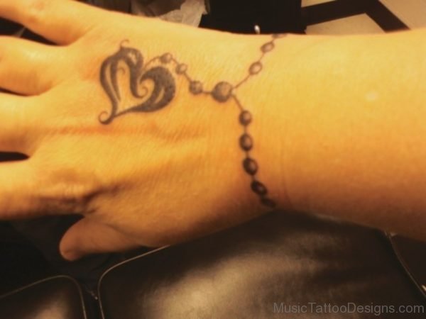 Cool Music Heart Tattoo On Wrist