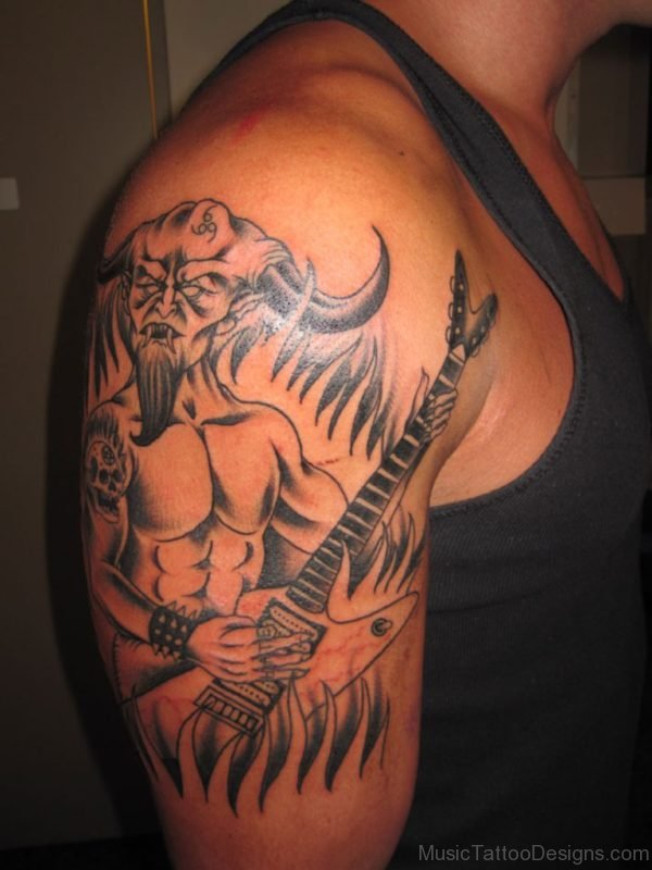 Devil With Guitar Tattoo On Shoulder