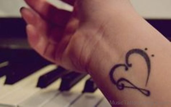 Elegant Music Heart Tattoo On Wrist
