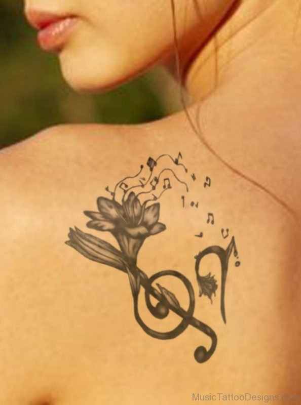 Elegant Music Notes Tattoo