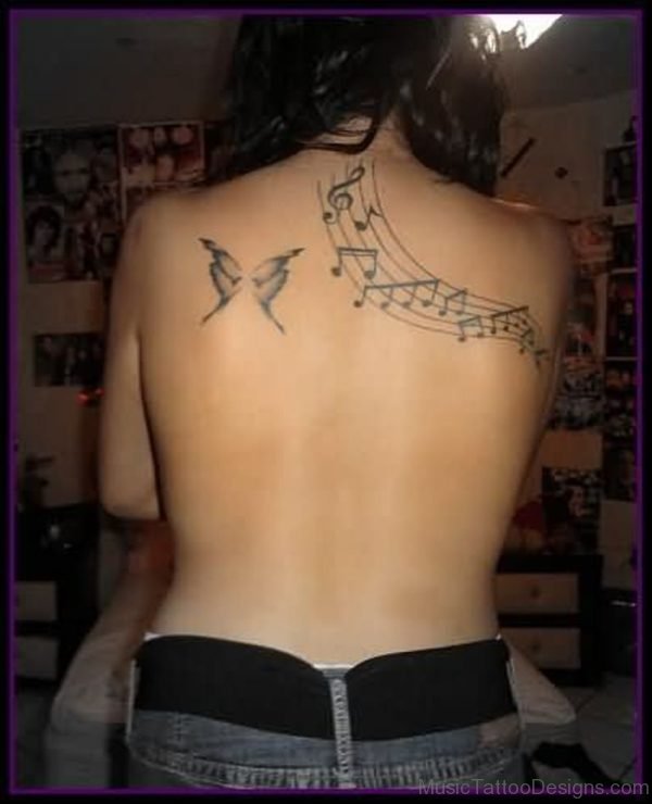 Excellent Music Tattoo On Back