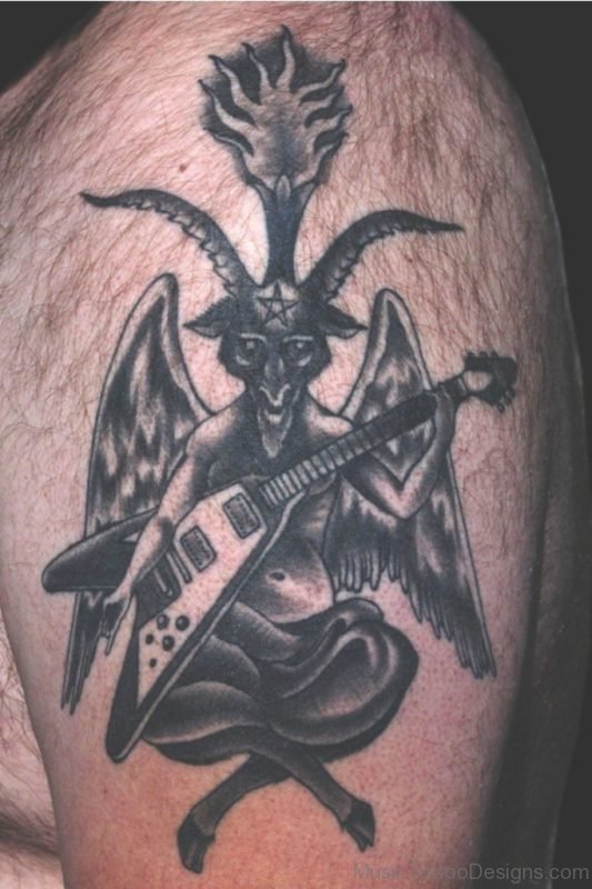 Flying Skull Guitar Tattoo On Shoulder