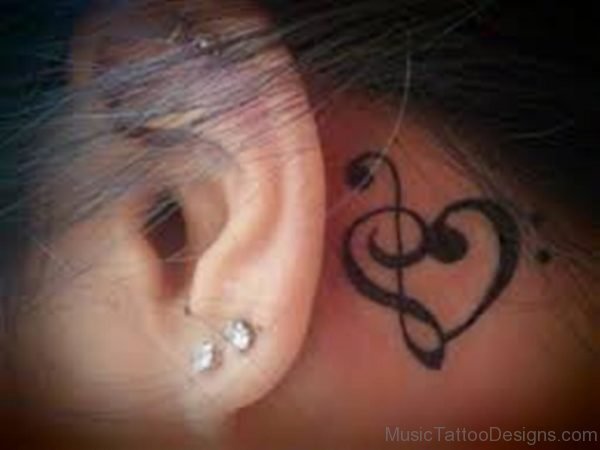 Good Looking Music Tattoo On Behind Ear