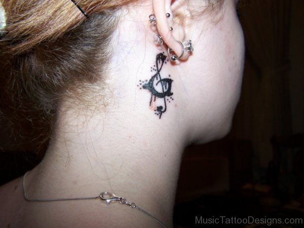Graffiti Tattoo On Girl Behind Ear