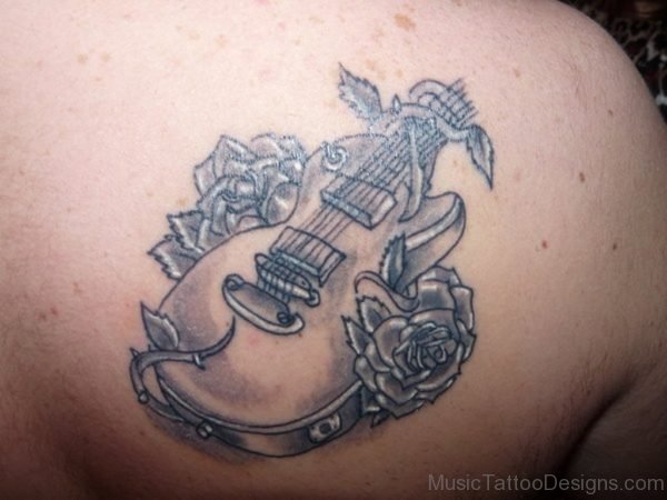 Grey Flower And Guitar Tattoo On Right Back