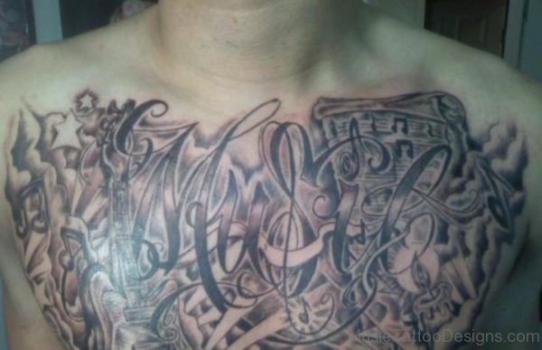 Grey Ink Music Tattoo On Chest