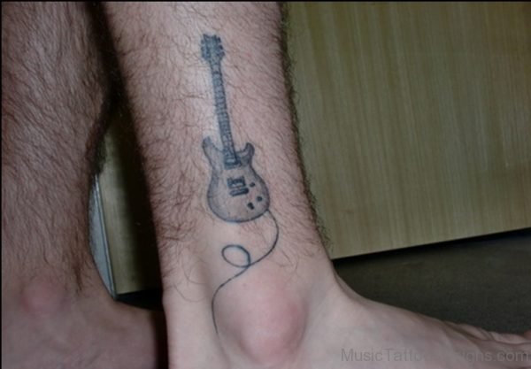 Guitar Musical Tattoo On Leg