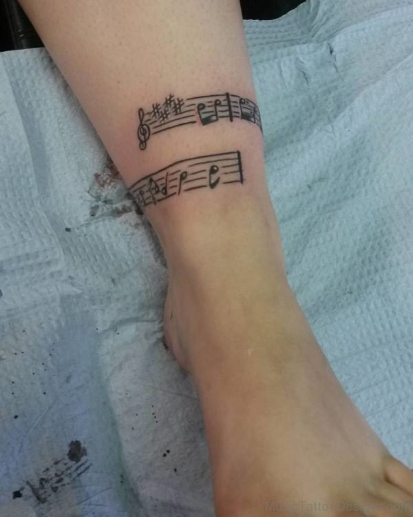 Leg Music Note Tattoo