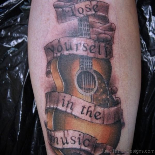 Lose Yourself In The Music Guitar Tattoo On Leg