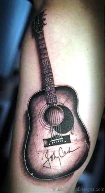 Lovely Guitar Tattoo On Arm 