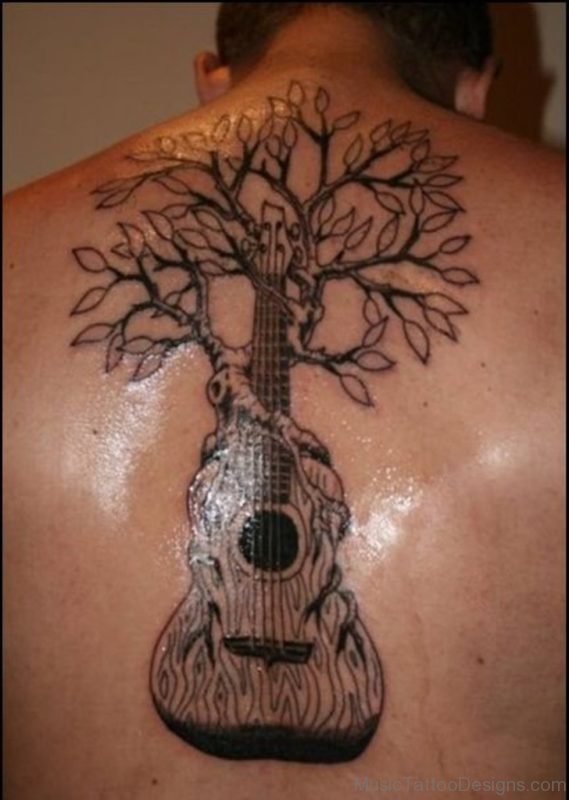 Magnificent Tree With Guitar Tattoo On Back