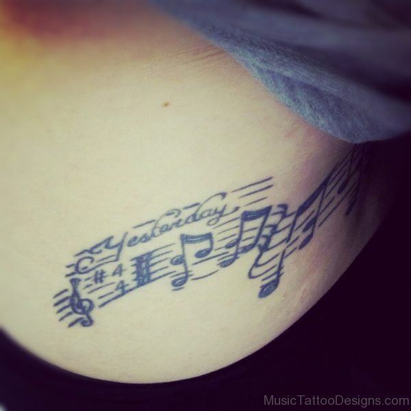 Music And Tattoo On Chest