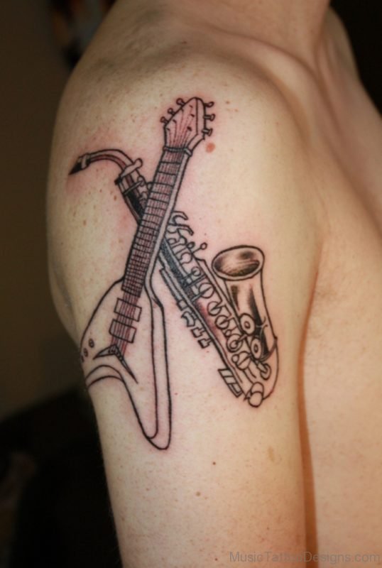 Music Instrument And Guitar Tattoo On Shoulder