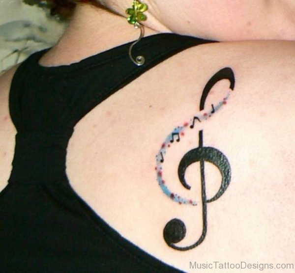 Music Note Tattoo on Back of Shoulder
