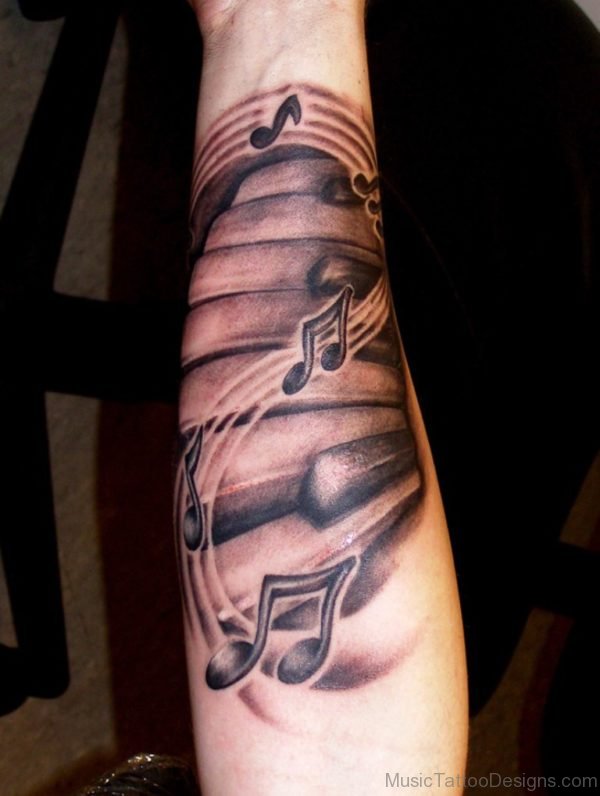 Music Notes Grey Ink Piano Keys Tattoo on Arm