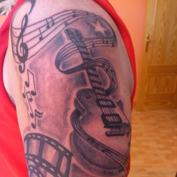 Music Notes With Guitar Tattoo On Shoulder For Men