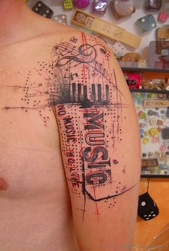 Music Notes key Tattoo On Left Shoulder