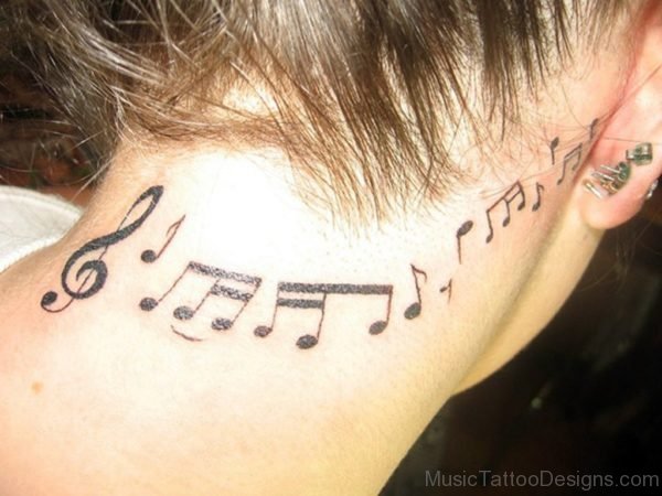 Music Tattoo Beside Of Ear And Nape