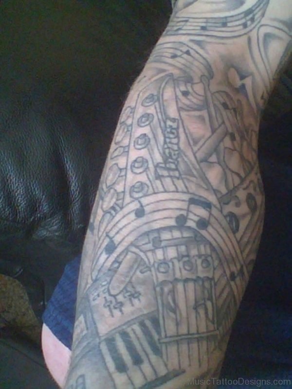 Music Tattoo On Left Arm