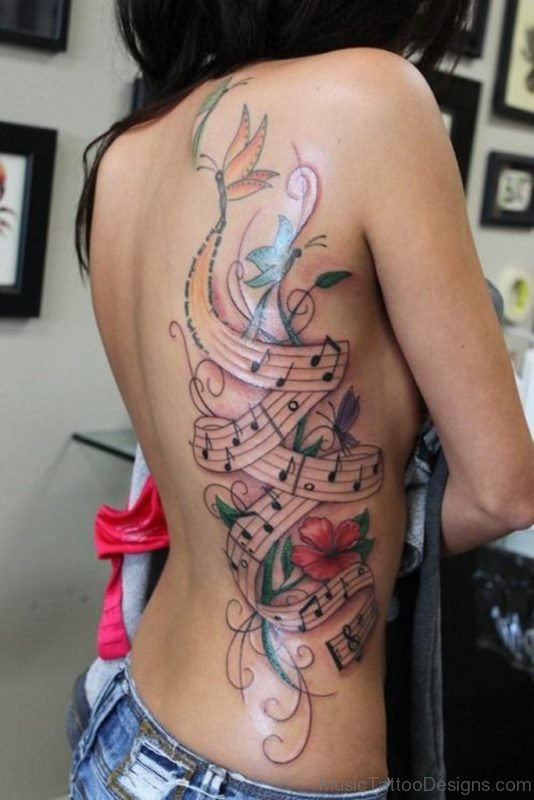 Music Tattoo On Rib And Back