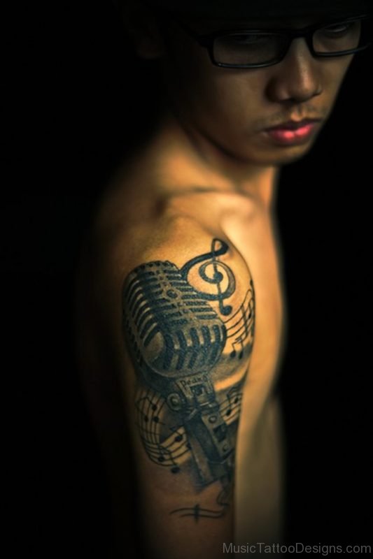 Music Tattoo On Right Shoulder