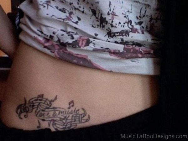Music note tattoos on back