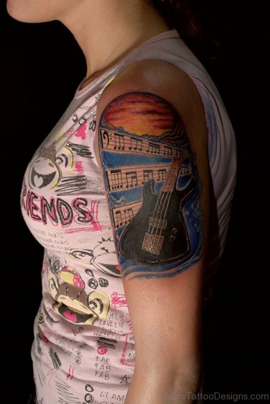 Musical Notes And Guitar Tattoo 