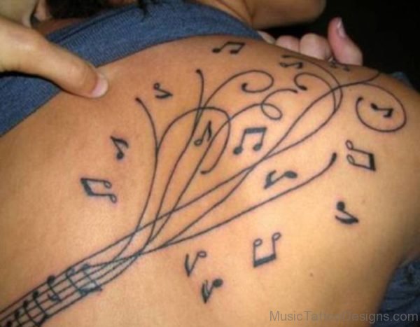 Musical Notes And Guitar Tattoo