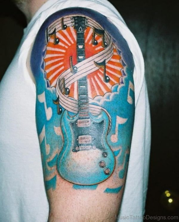Nice Guitar Tattoo On Shoulder