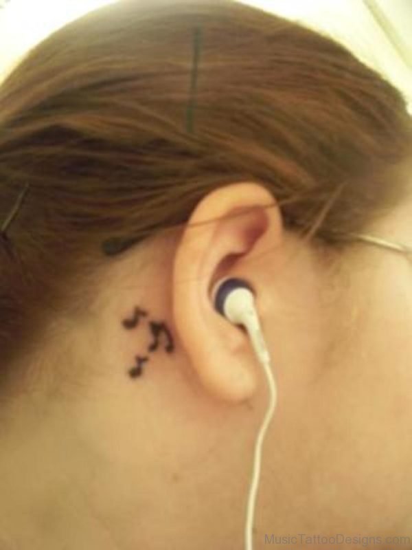 Pretty Music Notes Behind Ear Tattoo